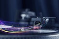 Turntable playing vinyl with glowing abstract lines Royalty Free Stock Photo