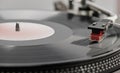 Turntable is playing vinyl LP record Royalty Free Stock Photo