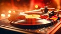 Turntable playing vinyl record with bokeh lights on background Royalty Free Stock Photo