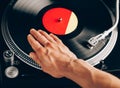 Turntable scratch, hand of dj on the vinyl record Royalty Free Stock Photo