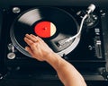 Turntable scratch, hand of dj on the vinyl record Royalty Free Stock Photo