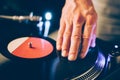 Turntable scratch, hand of dj on the vinyl record Royalty Free Stock Photo