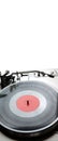 Turntable in silver case with vinyl record with red label isolated on white background top view Royalty Free Stock Photo