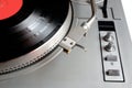 Turntable in silver case with vinyl record with red label isolated on white background. top Royalty Free Stock Photo