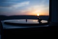 Turntable vinyl record player on the background of a sunset over the mountains. Sound technology for DJ to mix & play music. Black Royalty Free Stock Photo
