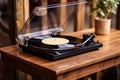 turntable vinyl record player on wooden table