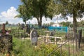 Turov, Belarus - August 7, 2016: place of worship pilgrims growing stone cross in a cemetery in the town of Turov, Belarus.