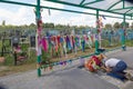 Turov, Belarus - August 7, 2016: place of worship pilgrims growing stone cross in a cemetery in the town of Turov, Belarus.