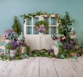 Turqoise spring sett up with colourful flowers pink , purple, bleu, and turqoise  flowers, vintage wood parquet Royalty Free Stock Photo