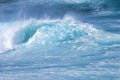 Turquioe wave crashin at Ho\'okipa beasch on Maui.