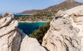 Turquoise Aegean sea, rocks and green mountains. Knidos, province Mugla, Turkey