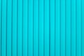 Blue abstract corrugated metal wall