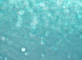 Turquoise background of shining drops of water Royalty Free Stock Photo