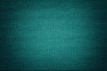 Turquoise background from a textile material with wicker pattern, closeup Royalty Free Stock Photo