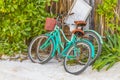 Turquoise bikes bicycles at caribbean coast and beach Tulum Mexico