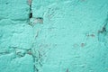 Turquoise blue brick wall detail texture background. Old, painted, weathered and cracked stone bricks with concrete and stucco Royalty Free Stock Photo