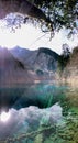 Turquoise Blue Lake with mountain and sunshine in Jiu Zhai