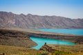 Turquoise blue water in Barrage Al-Hassan Addakhil in dry nature near Errachidia in Morocco Royalty Free Stock Photo