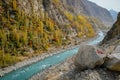 River flowing through Karakoram mountain range along Karakoram highway and colorful foliage in autumn Royalty Free Stock Photo