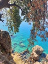 Turquoise blue water seen from the cliff in antalya, turkey Royalty Free Stock Photo