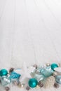 Turquoise and blue wooden snowy white christmas background with Royalty Free Stock Photo