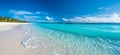 Turquoise calm ocean and white sandy beach landscape in the Maldives Royalty Free Stock Photo