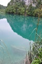 Turquoise clear water with sank Boat at the bottom