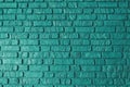 Turquoise colored brick wall texture, architecture building, masonry of stone blocks background Royalty Free Stock Photo