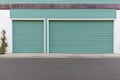 Turquoise colored garage door Royalty Free Stock Photo