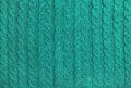 Turquoise colored knitted wool background Knitting pattern