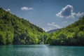 Turquoise coloured lake and small waterfall, Plitvice Lakes Royalty Free Stock Photo