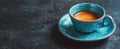 The turquoise cup of coffee with saucer on a dark surface. AI generated image Royalty Free Stock Photo