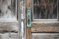 Turquoise Door Handle on Antique Door Royalty Free Stock Photo