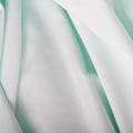 Turquoise fabric with folds