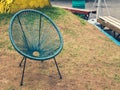 Turquoise garden chair at the lounge zone. Rest outdoor area Royalty Free Stock Photo