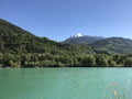 Turquoise glacier lake in alpine region. Royalty Free Stock Photo