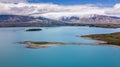 Turquoise glacier lake with small island Royalty Free Stock Photo