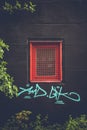 Turquoise graffiti on black wall Royalty Free Stock Photo