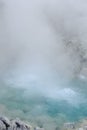 Turquoise hot boiling water in geyser in mountain valley at Tamagawa Onsen Hot spring in Semboku city, Akita prefecture, Tohoku