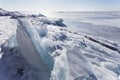 Turquoise ice floes of Lake Baikal. Winter landscape