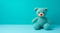 Turquoise Knitted Teddy Bear On Colorful Background