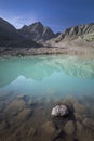 Turquoise lake Gradensee at Nossberger Hut with mountains in Gradental in national park Hohe Tauern, Austria Royalty Free Stock Photo