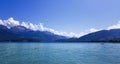 Turquoise lake, mountains and blue sky Royalty Free Stock Photo