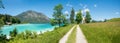 Turquoise lake Walchensee, hiking trail peninsula Zwergern, view to herzogstand mountain bavaria Royalty Free Stock Photo