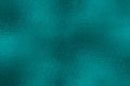 Turquoise metallic effect. Texture shine foil. Background with glitterer metal effect. Blue green surface. Backdrop glitter mint m
