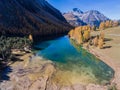 Turquoise mountain lake surrounded by forest Royalty Free Stock Photo