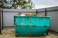 Rusty metal dumpster