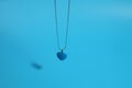 Turquoise pendant heart shape, elegant gem on chain Royalty Free Stock Photo