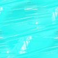 Turquoise plastic surface with white highlights and diagonal lines. Beautiful seamless turquoise background. Royalty Free Stock Photo