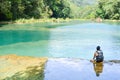 Turquoise pools and limestone bridges surrounded by the jungle i Royalty Free Stock Photo